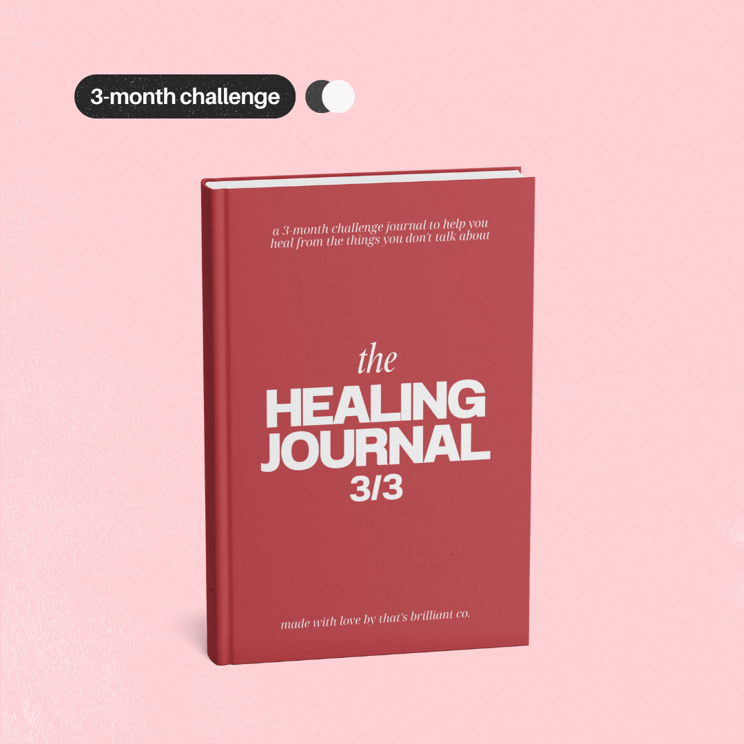 A red hardcover journal titled 'the HEALING JOURNAL 3/3' shown standing upright on a light pink background, with a black badge at the top left reading '3-month challenge'.